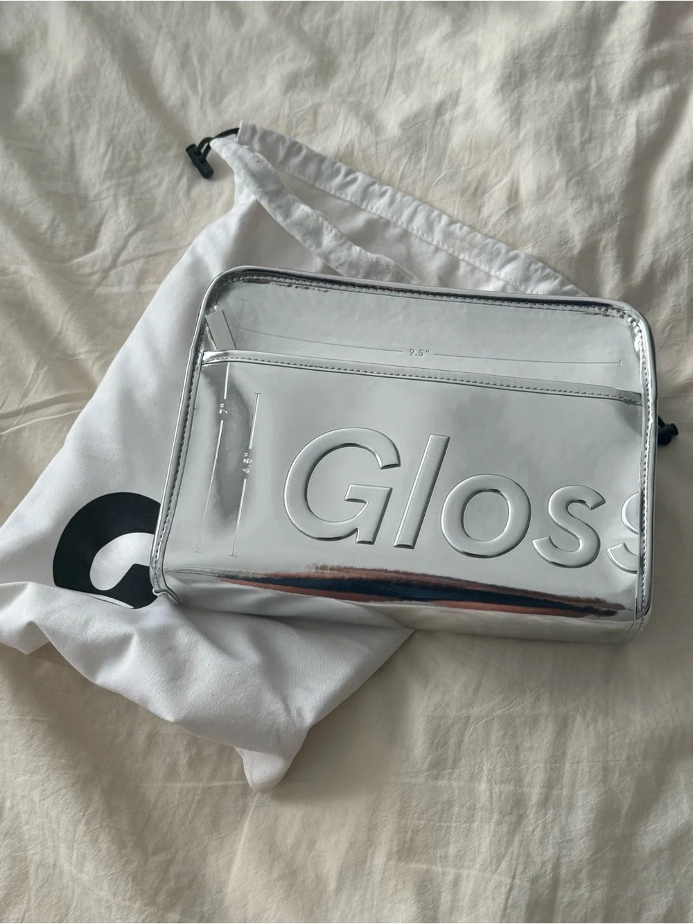 Limited Glossier Chrome make-up bag